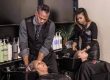 hairstylists washing clients' hair