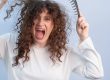 Curly hair tangles badly causing painful discomfort while brushing